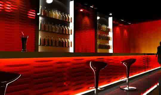 A Red Bar By Decorative Wall Panels